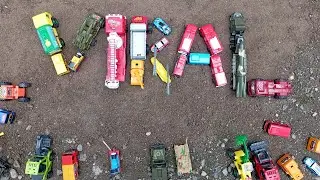 Arranging a Tronton Truck, Fire Truck, and Bus to Form the Word VIRAL