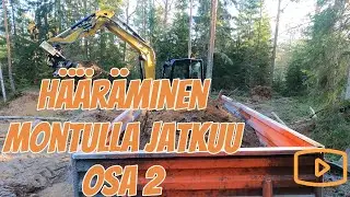 Traktori ja kaivuri t&auml;ydess&auml; ty&ouml;ss&auml; hiekkamontulla osa 2