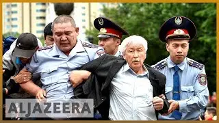 Kazakhstan police and protesters clash after poll