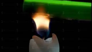 Macro candle smoke. Details of a candle flame, studio isolated. Match and candle on a black