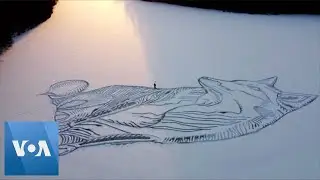 Giant Fox Carved Atop Frozen Lake in Finland