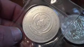 Silver & Gold: PAMP Rooster, Rwanda Hippos, R.A.M. 1/2 oz Gold Roo