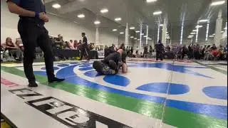Corey Hicks with a mounted triangle win over David Rans
