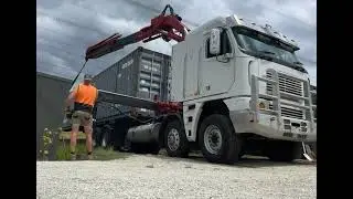 Slotting a 40ft Container btwn a shed and another container. Crane Services - Container Solutions