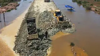 Building Big Lake's Future: Paving Long, Quality Roads with Shantui Dozers and Trucks Unloading