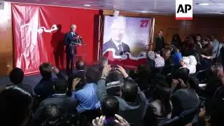 Presidential candidate Hama Hammami speaks to supporters
