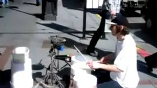 Seattle street performer goes bucket bananas.