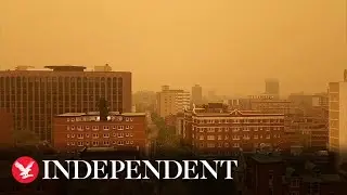 Orange smog envelops Ottawa as Canada wildfires continue to fill skies