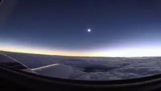 March 2015 Solar Eclipse from light aircraft at altitude, above the clouds.