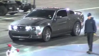 Flat Black Nissan GTR vs 2013 Ford Mustang GT Drag Race
