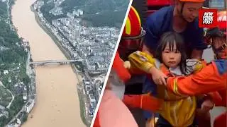 Families in China rescued from 'worst flooding in decades' after being trapped for hours