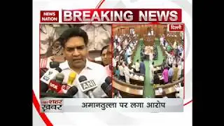 Sacked AAP Leader Kapil Mishra thrashed inside Delhi Assembly