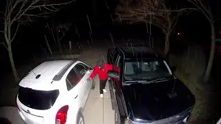 Security video shows masked suspect checking car doors in Rockford, Michigan