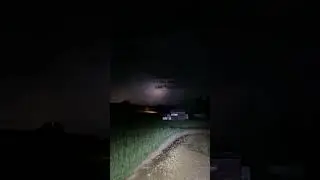 Captivating Night: Witness Distant Lightning Over a Rural Landscape#lightning #nightsky