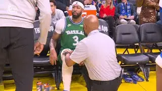 Anthony Davis holds the groin area and heads to the locker room due to an injury vs. the Warriors