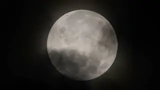 Full Wolf Moon and Rain Clouds