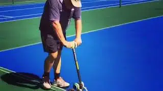 Tennis court white line application Grand Slam Surfacing