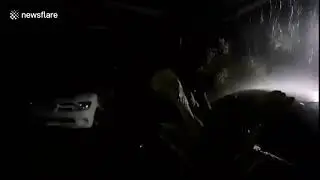Vehicles drive through flooded streets as Typhoon Noul hits Thailand