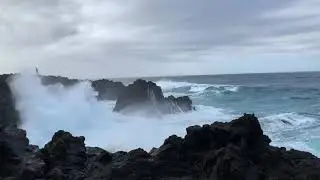 S&atilde;o Miguel, Azores. Massive 50 foot waves crashing along volcanic cliffs.