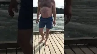 Canadian Bear caught on camera jumping into frozen lake.
