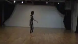Laura Peterson tries to learn Mina's dance at Video Arts Festival