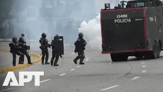 Tear Gas Clouds Colombia's Bogot&aacute;: Explosive Student-Police Clashes Shake Capital | APT