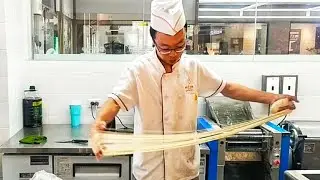 Hand-pulled noodles with incredible ease by a Bangkok noodle master