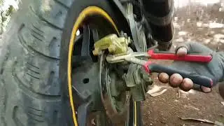 How to change rear brake pad for Rs200 pulsar