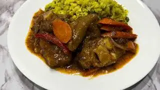 foodie Sunday dinner. Haitien Ragou pye bef and Tumeric rice/ Cow feet stewed and Tumeric rice.