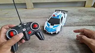 Mainan remot kontrol mobil robot polisi