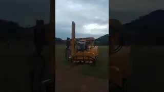 Solar pile driver pilling posts for solar project in Malaysia.