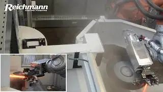 Roboter-Trennzelle f&uuml;r Abgaskr&uuml;mmer aus Stahlguss - REICHMANN ROBOTER CENTER