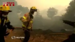 Crews battle wildfire in Catalonia