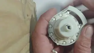 How to install a beaded chain in a Rollease R8C03 clutch.
