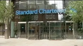 StanChart worried about regulatory costs despite record profit