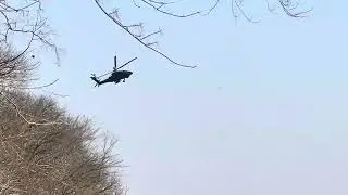 NC National Guard Boeing AH-64E Apache Guardian [22-03412] flying over the Cape Fear River