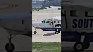 Cessna Grand Caravan Taxiing At O'hare International Airport/Southern Airways Express