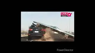 Road sign falls on car