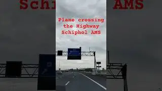 Airplane rossing the Highway at Schiphol Airport AMS