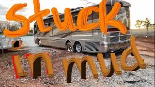 American Eagle RV STUCK in the mud, Side by side Mahindra Roxor helps to pull it out!