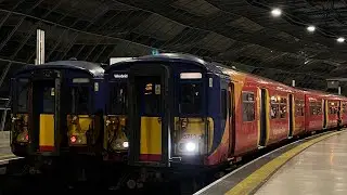 Two Sets of SWRs class 455s passing wimbledon at speed on a Guildford Service