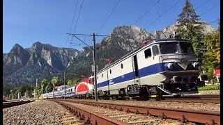 Passengers trains pass under the Carpathian Mountains