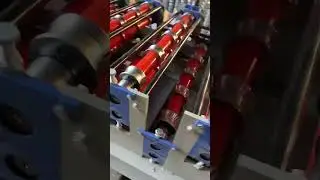 Roll forming machine for corrugated sheet