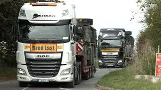 Trucks hauling US military vehicles and equipment across NATO area 🪖