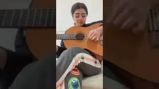 HOT ARAB GIRL PLAYS GUITAR
