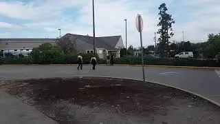 Transit security helping people cross the bus loop