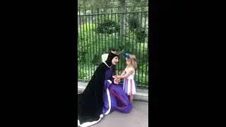 The Queen dancing and spinning around with Paisley at Disneyland