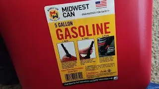 Talking out the plastic tube filter in a New 5 Gallon Gas Can
