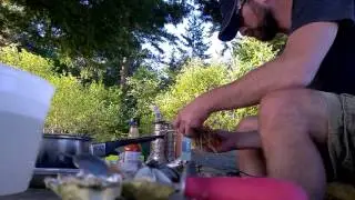 Sped up time lapse of starting a camp stove with sparks