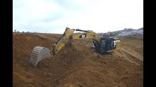 CATERPILLAR 324E - sloping